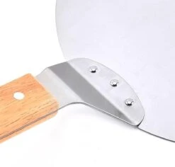 Luxe Pizzaschep Voor Verse Pizza - Extra Groot - RVS 30CM - Grote Pizza Schep Voor Oven Of BBQ Barbecue - Hout Handvat - Pizzaspatel Voor Zelfgemaakte Ovenpizza 9 Luxe Pizzaschep Voor Verse Pizza - Extra Groot - RVS 30CM - Grote Pizza Schep Voor Oven Of BBQ Barbecue - Hout Handvat - Pizzaspatel Voor Zelfgemaakte Ovenpizza -Barbecuebenodigdheden 1200x1148 2